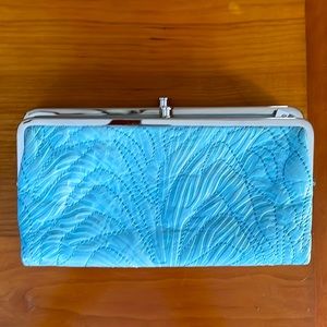 Hobo clutch, detailed stitching. Light blue.